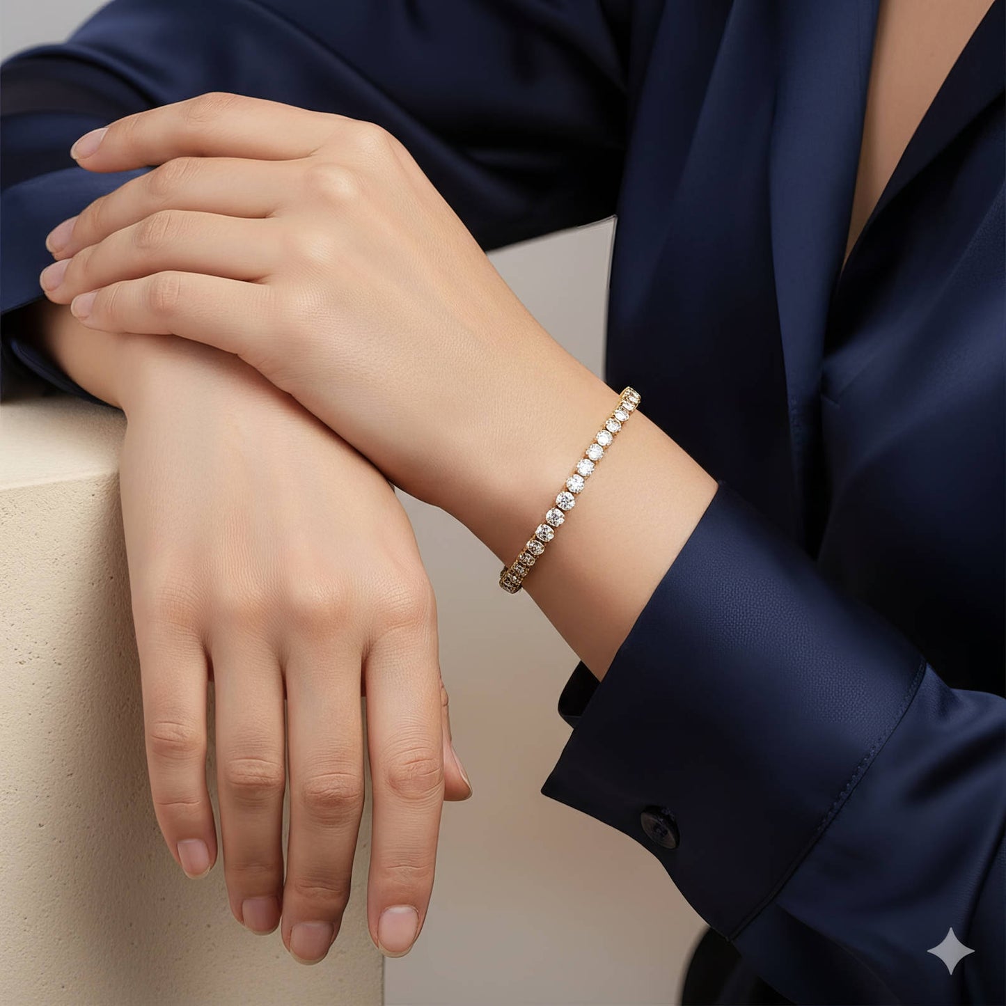 Close-up of a person wearing a bracelet with a neutral background