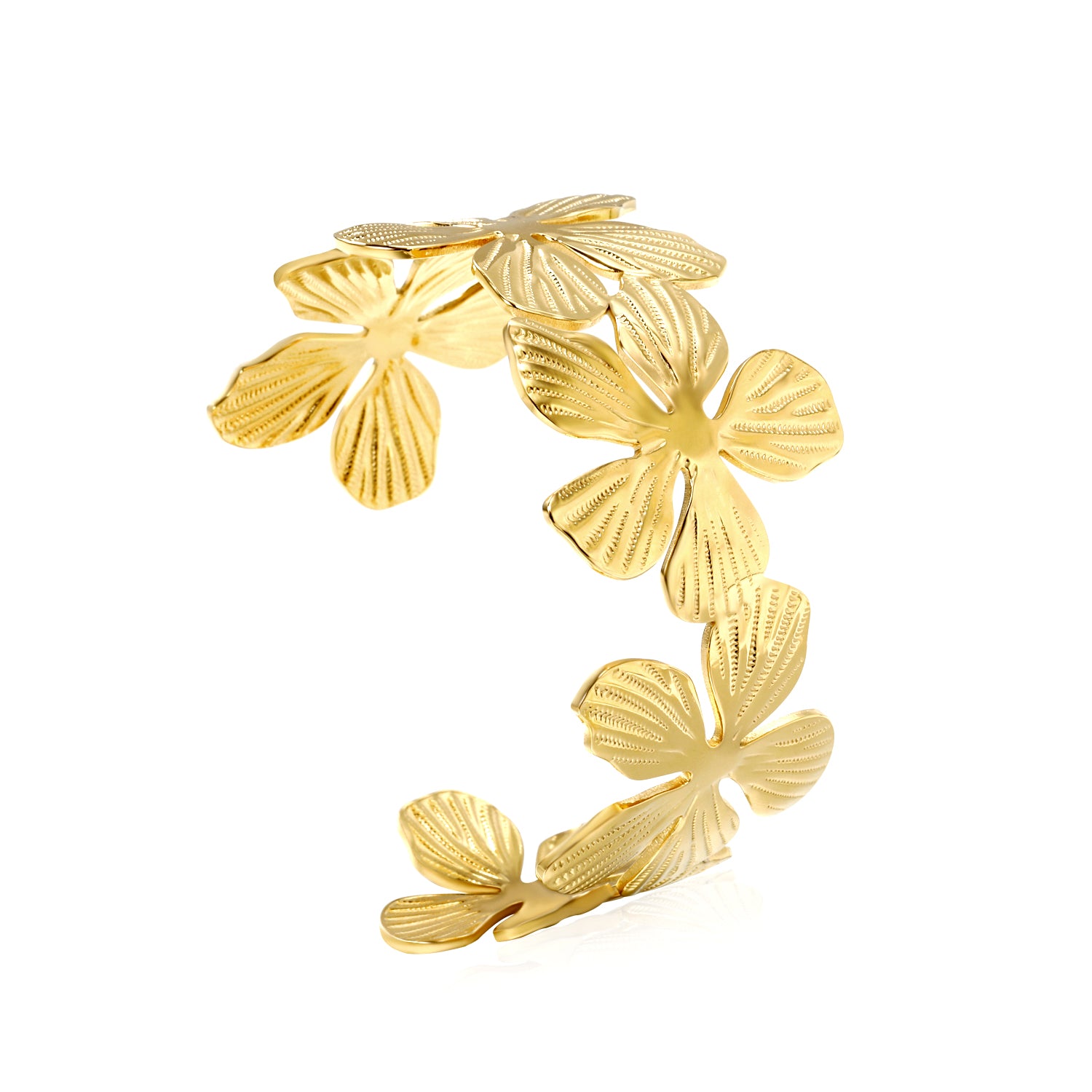 Gold bracelet with leaf-like design on a white background