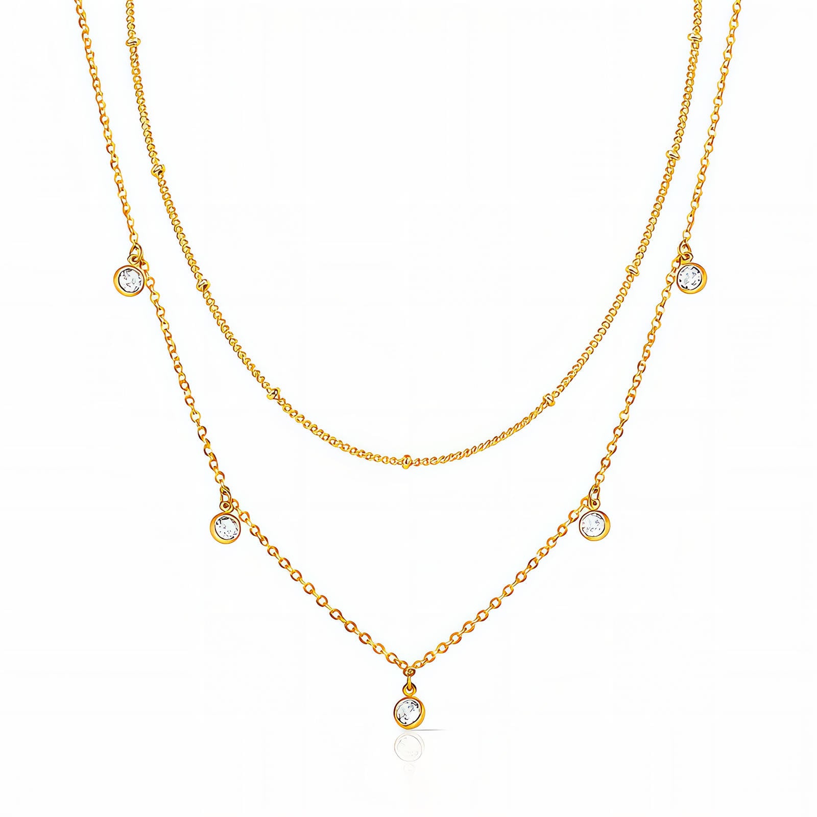 Two gold necklaces with small gemstones on a white background