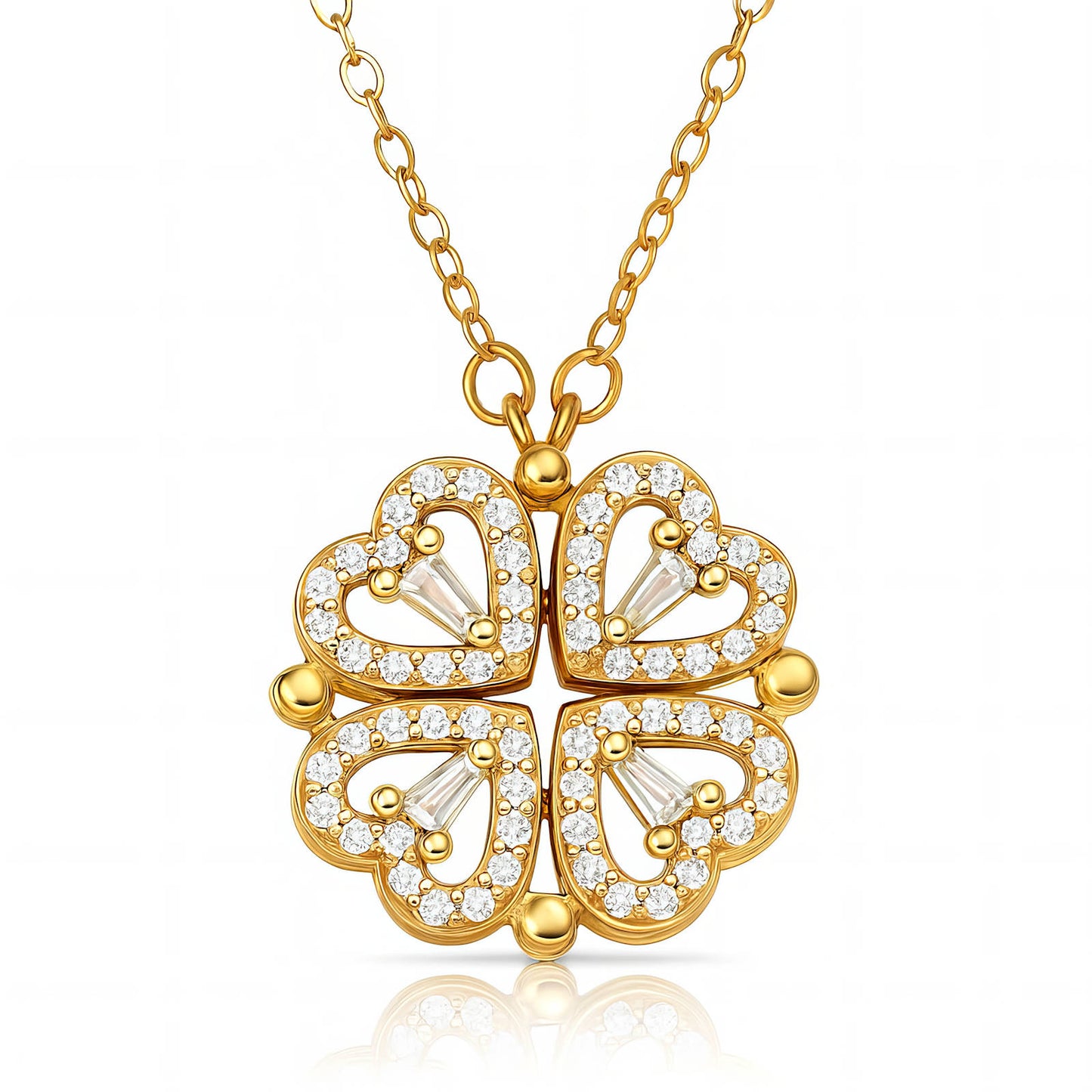 Gold necklace with a four-leaf clover pendant on a white background