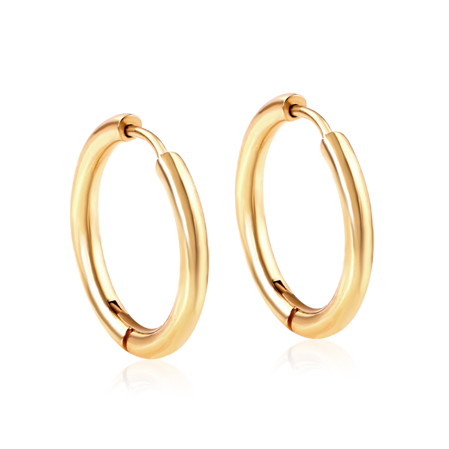 Gold hoop earrings on a white background