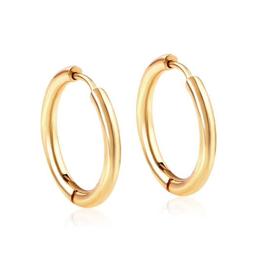 Gold hoop earrings on a white background