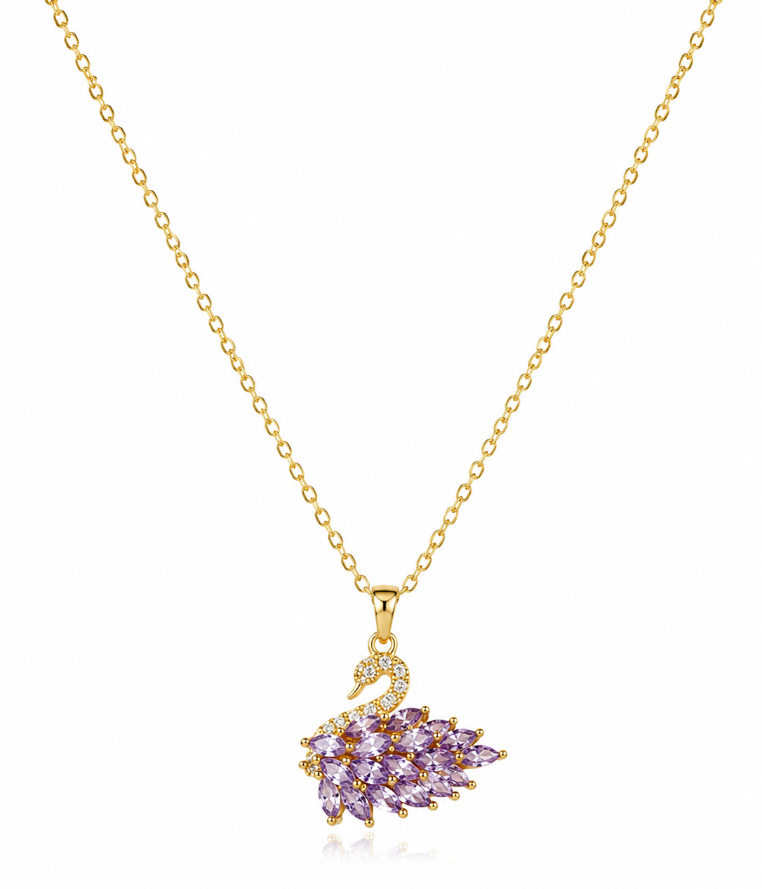 A gold chain necklace with a swan-shaped pendant featuring lavender purple marquise-cut stones and small clear accent stones, shown on a white background.