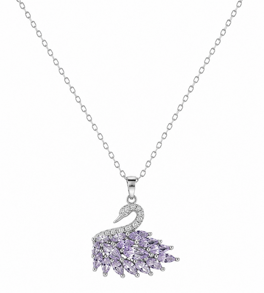 A silver-toned swan pendant necklace featuring a body made of light purple gemstones, displayed on a clean white background.