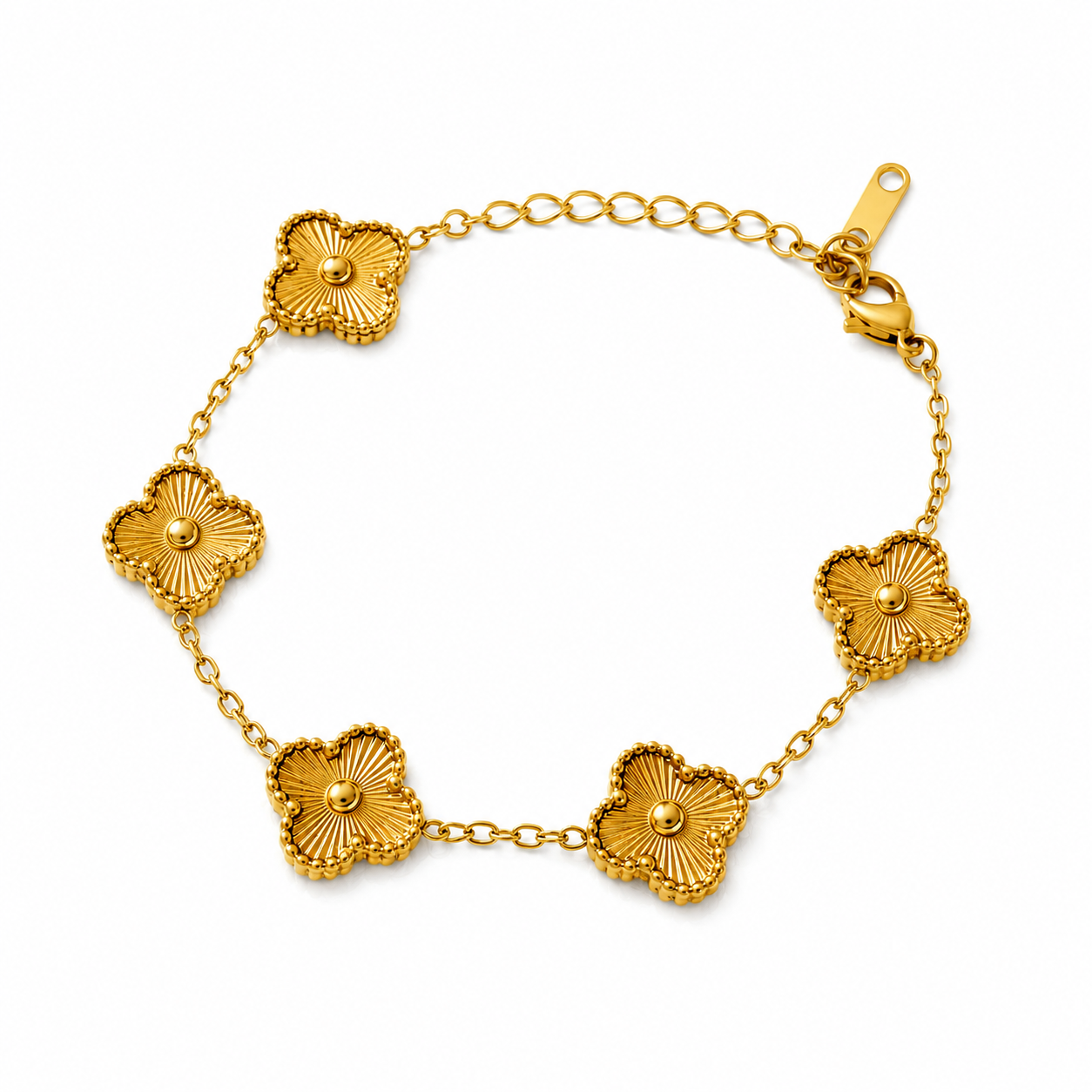 Gold bracelet with floral designs on a white background