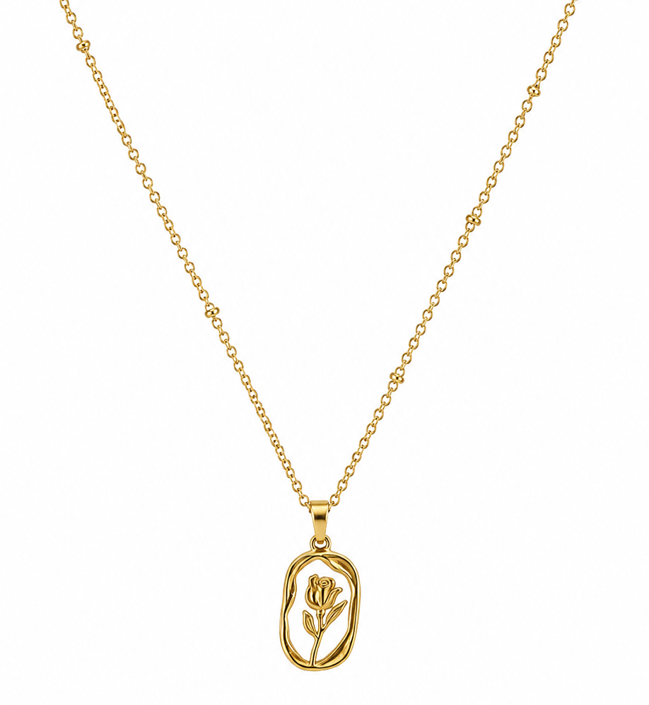 A delicate gold chain necklace featuring a small, openwork oval pendant with a stylized flower design, displayed against a solid white background.