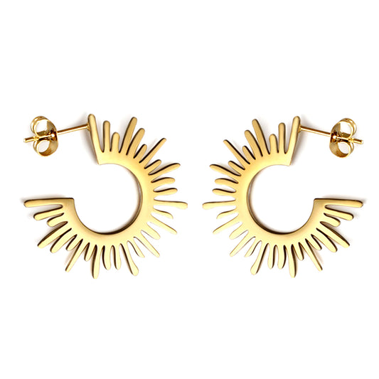 Gold hoop earrings with a sunburst design on a white background