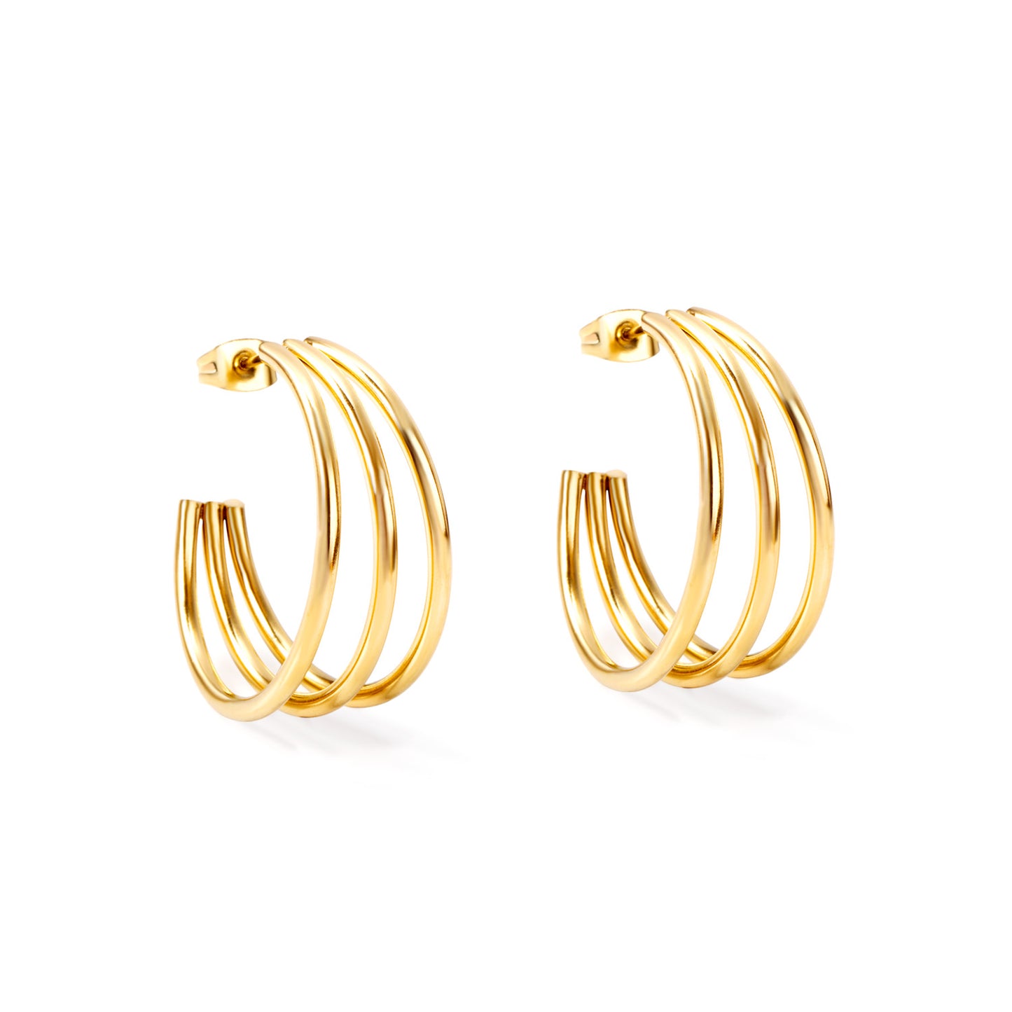 Gold hoop earrings on a white background